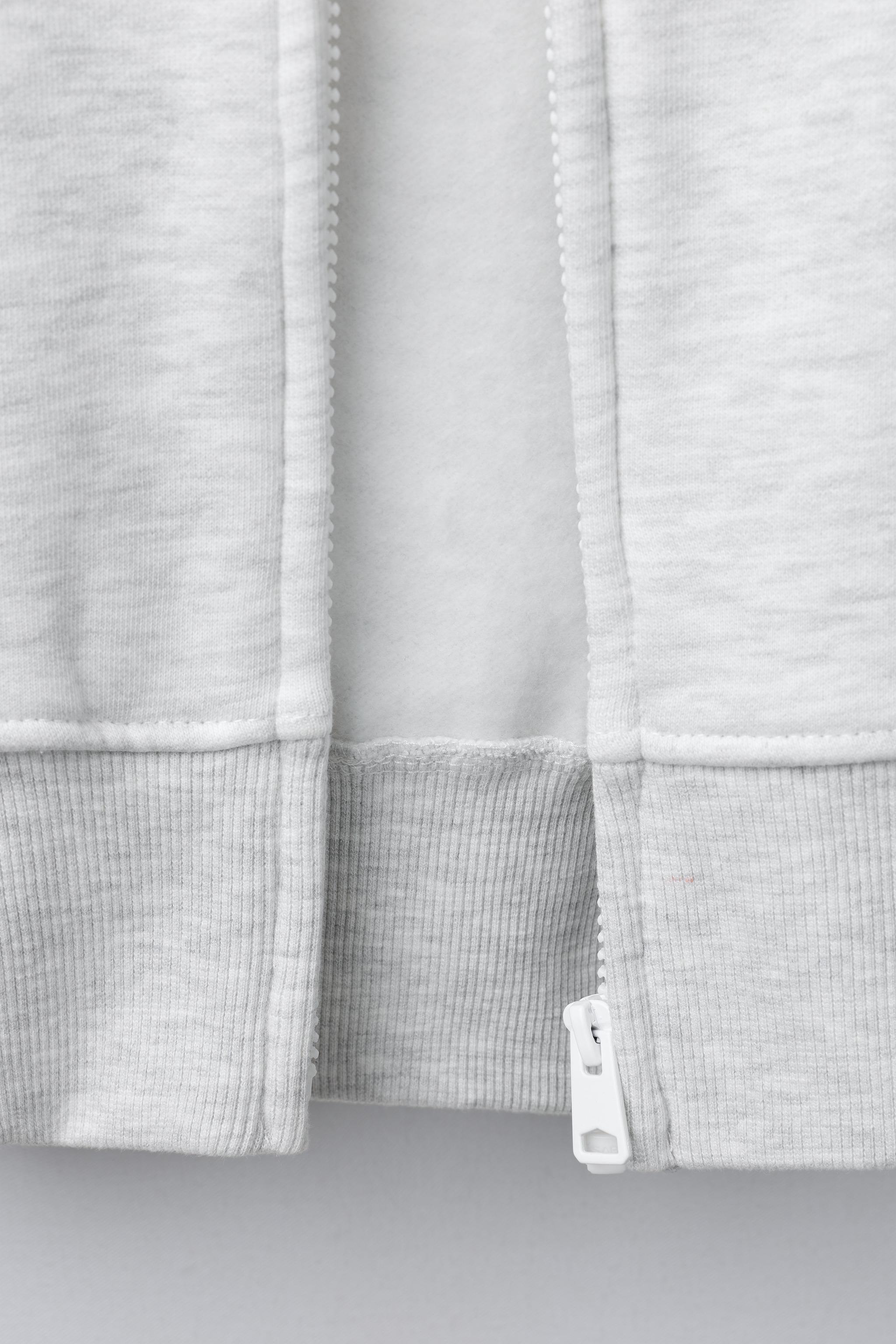 SWEAT EN MOLLETON ZIPP